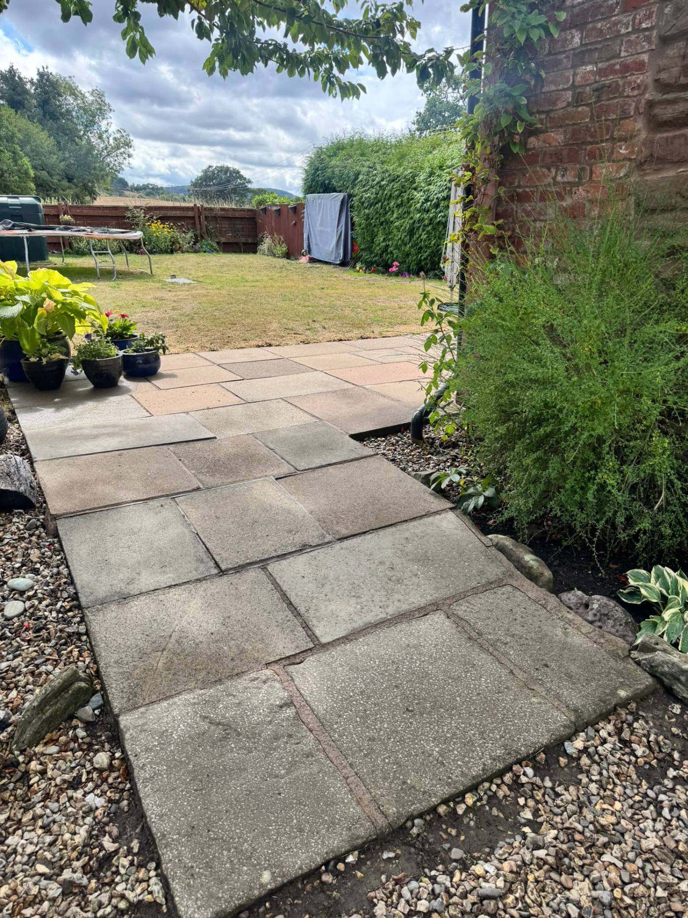 Paved path and slabs at a Hereford property, cleaned by Lofty Cleans