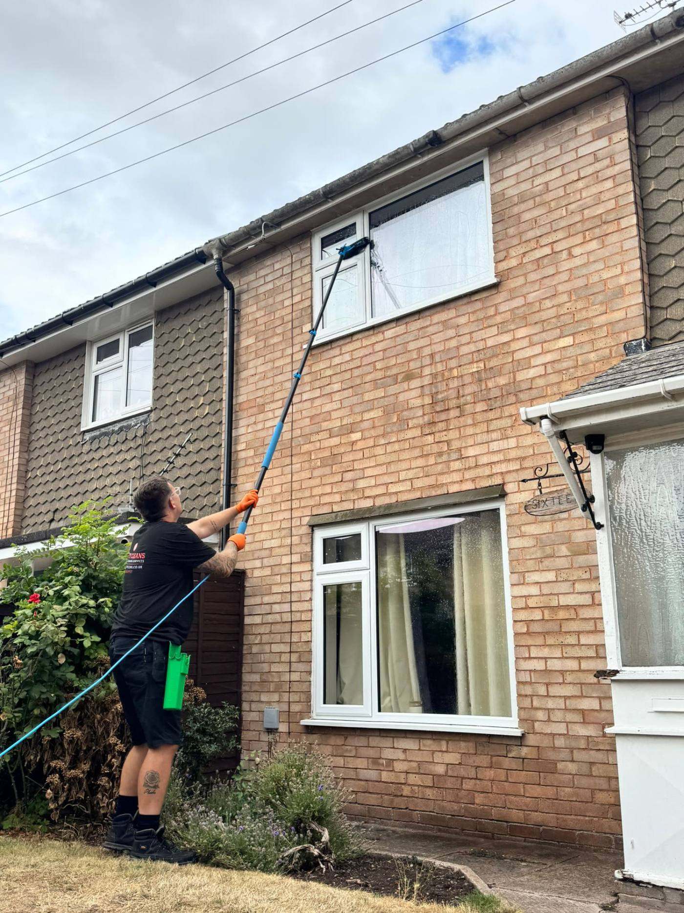 Water fed pole window cleaning on a Hereford home